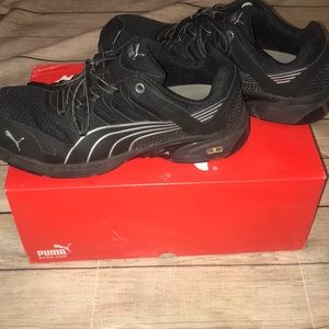 Puma composite toe tennis shoe